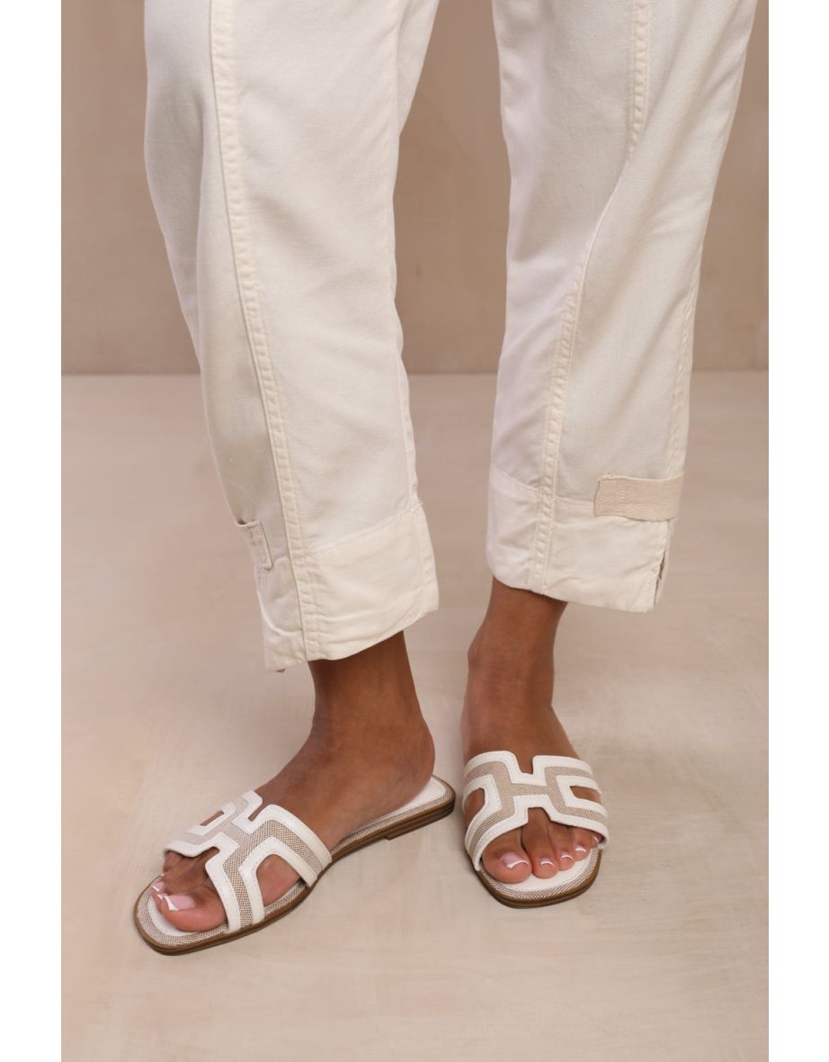 SURGE CUT OUT STRAP FLAT SANDALS IN WHITE FAUX LEATHER