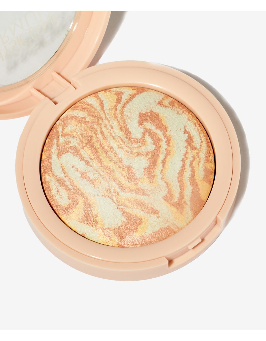 A radiance-boosting pressed powder -Translucent Glow - 1