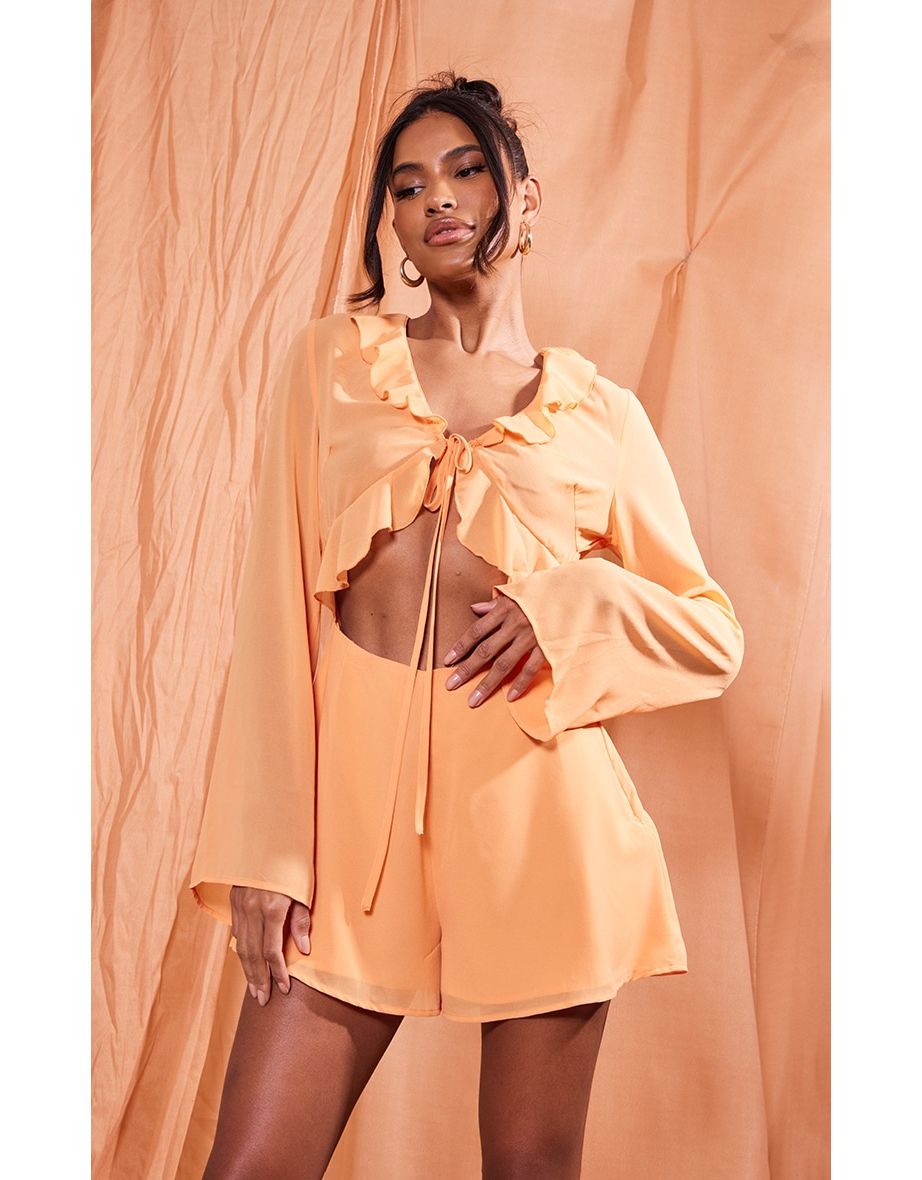 Shop Orange Chiffon Frill Tie Bust Detail Cut Out Playsuit Online in Qatar VogaCloset