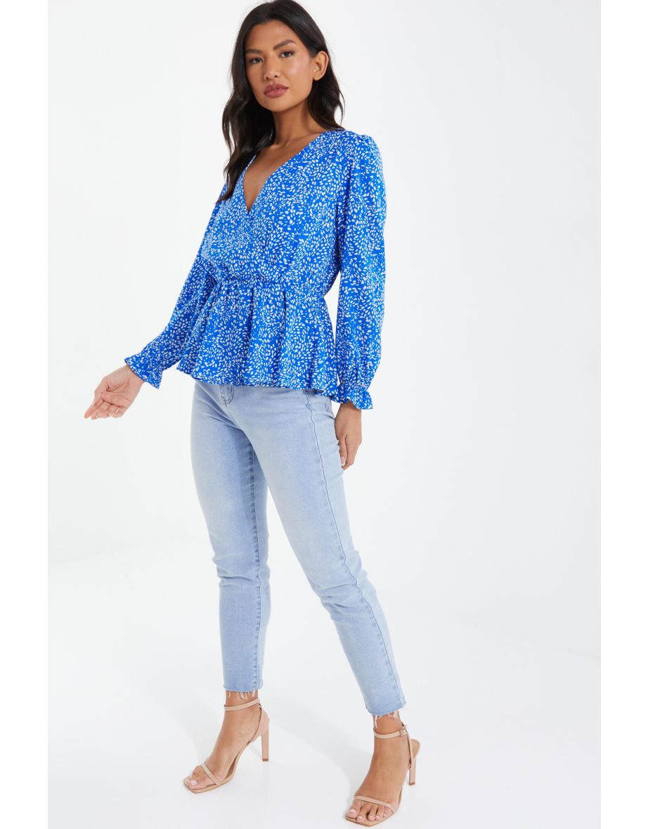 Shop Blue Smudge Animal Print Peplum Top Online in Qatar VogaCloset