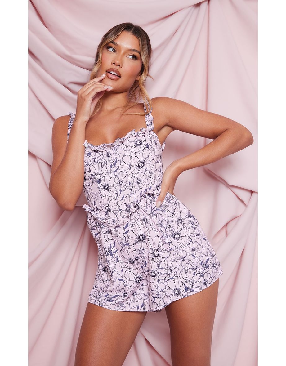 Shop Pale Pink Woven Floral Print Boning Frill Detail Playsuit Online in Oman VogaCloset