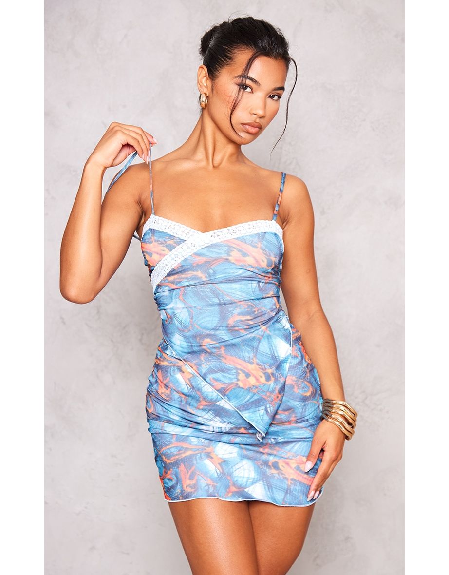 Shop Blue Abstract Print Cut Out Overlay Lace Trim Bodycon Dress Online in Bahrain VogaCloset