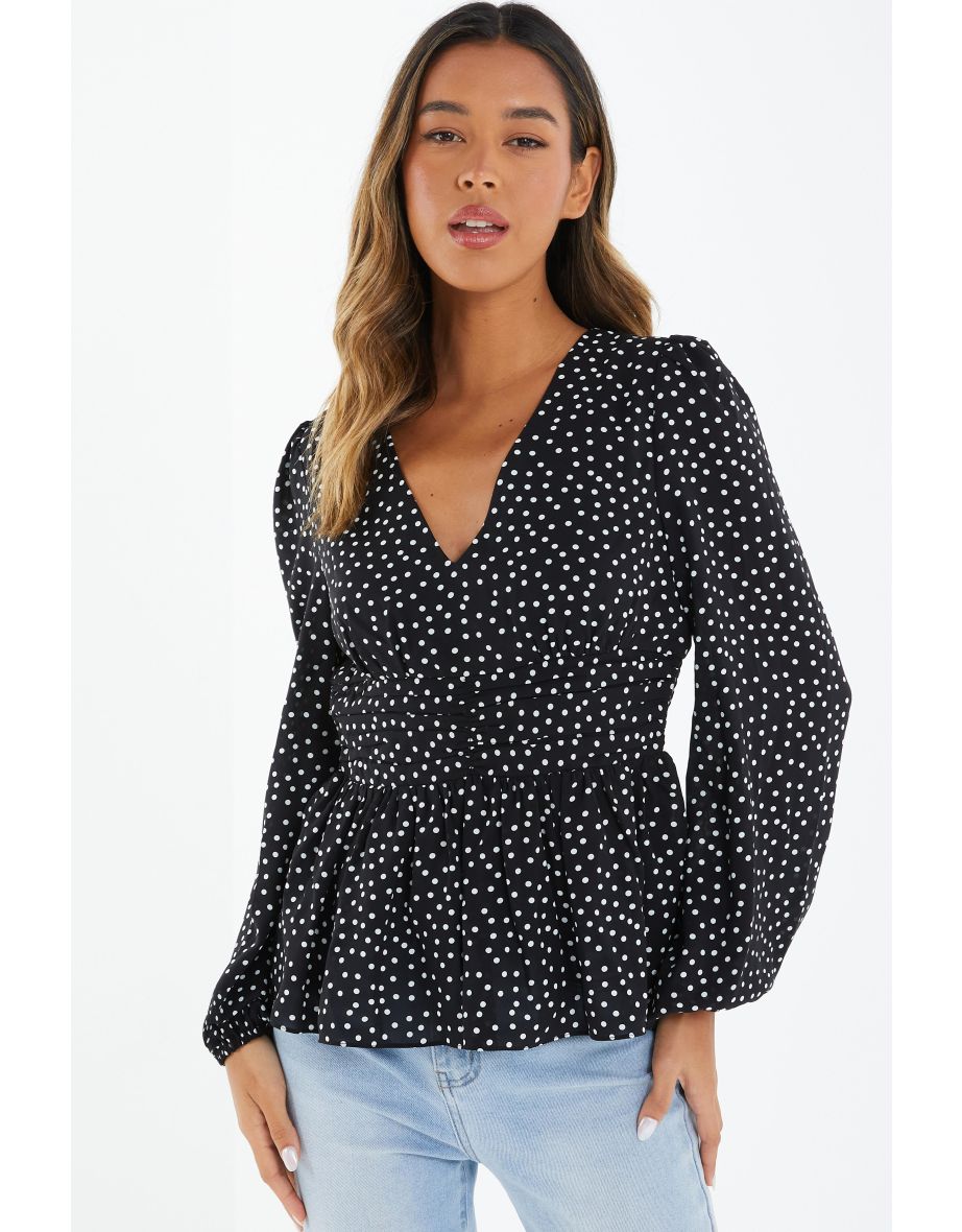 Spotty store peplum top