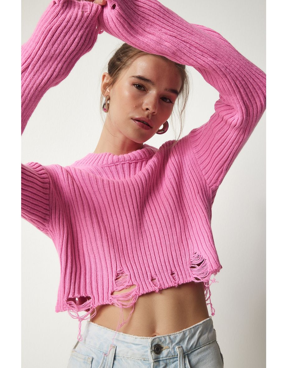 Pink hot sale ripped sweater