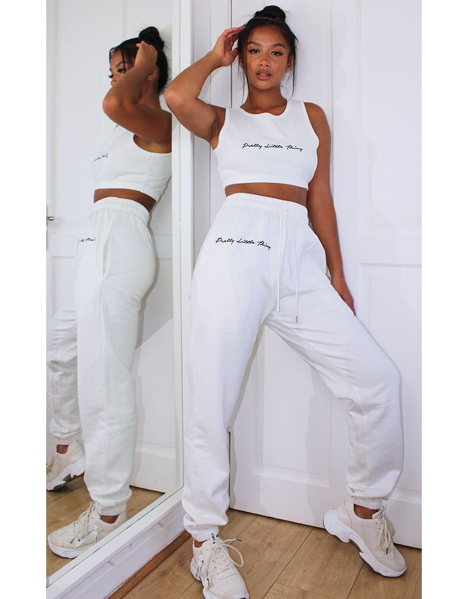 Shop PRETTYLITTLETHING Petite White Embroidered Oversized Fit Joggers Online in Oman VogaCloset