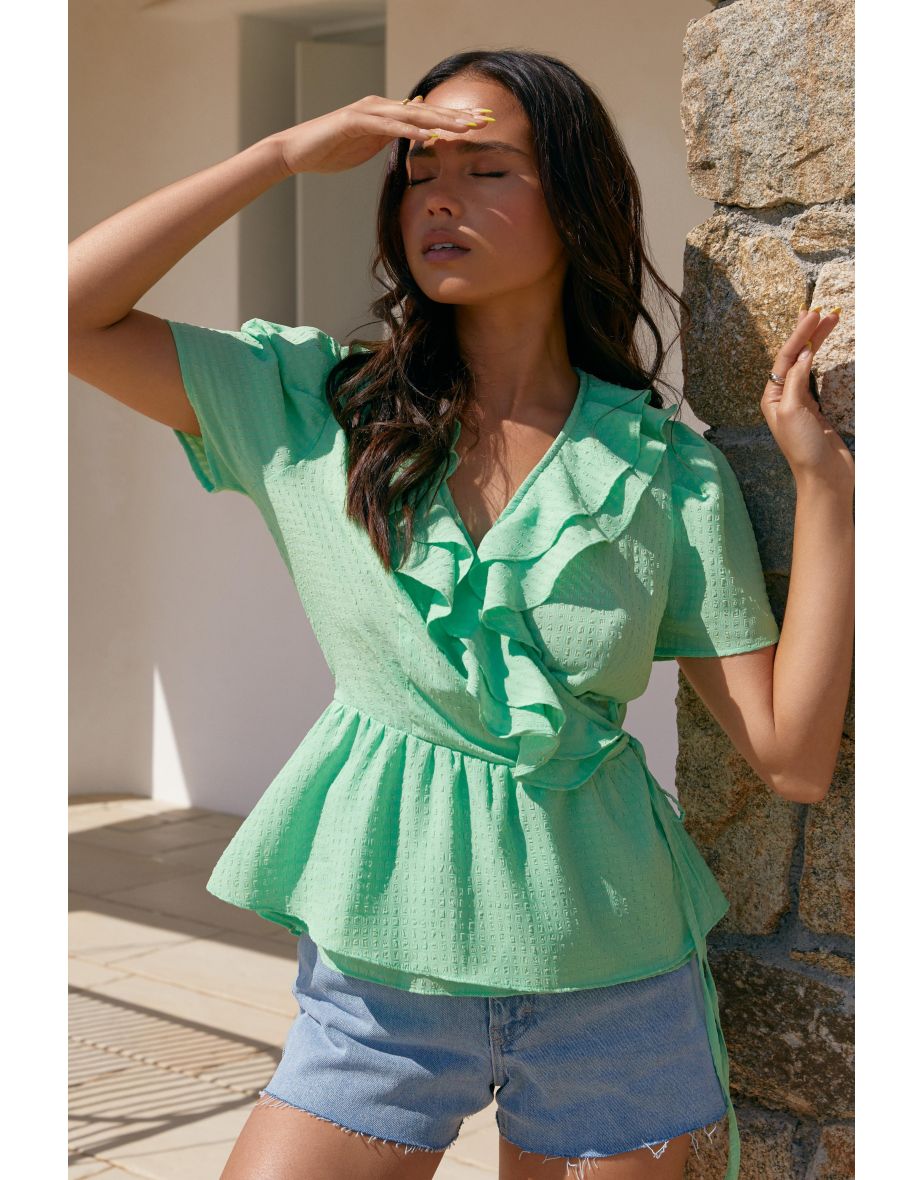 Shop Green Frill Peplum Blouse Online in Bahrain VogaCloset