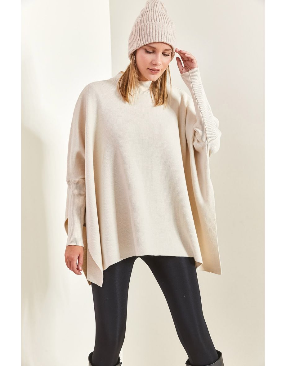 Women's Basic Oversized Poncho with Elasticated Sleeves.