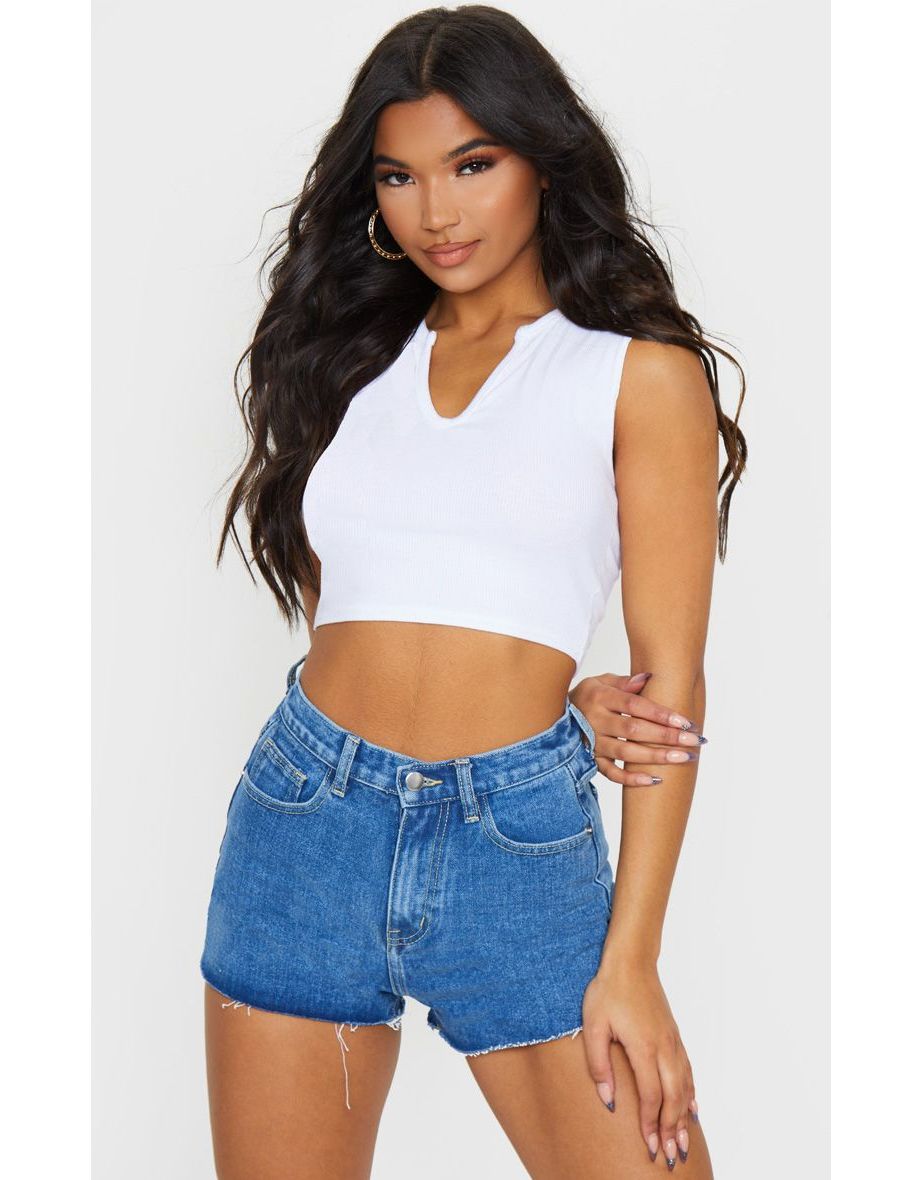PRETTYLITTLETHING Mid Blue Wash Raw Hem Hotpants