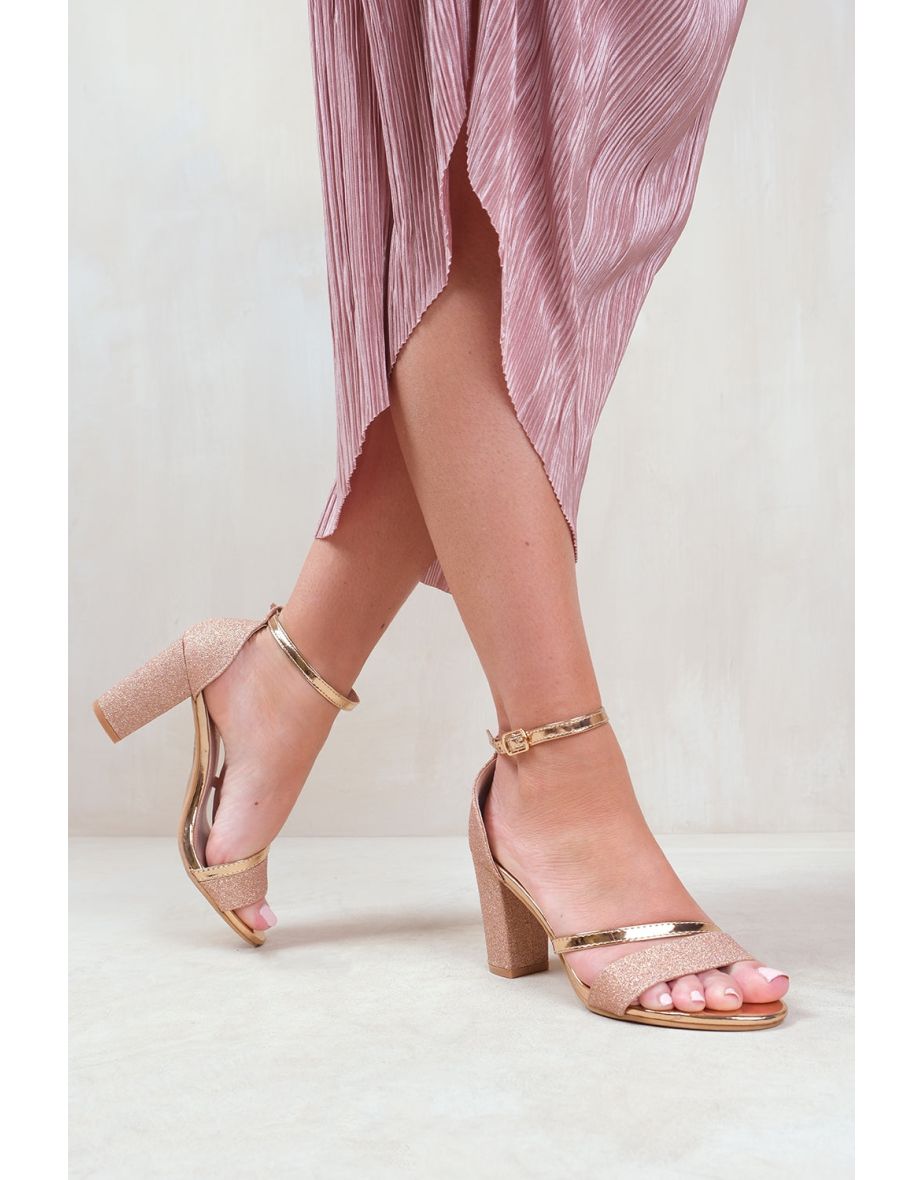 PERLA MID HIGH BLOCK HEEL SANDALS WITH ANKLE STRAP IN ROSE GOLD GLITTER