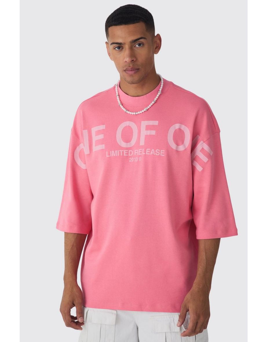 Oversized Extended Neck Interlock Graphic T-shirt - pink