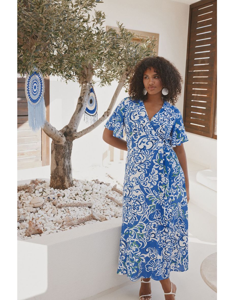 Shop Trendyol Curve Plus A Line Wrap Midaxi Dress with Floral Prints Online in Qatar VogaCloset