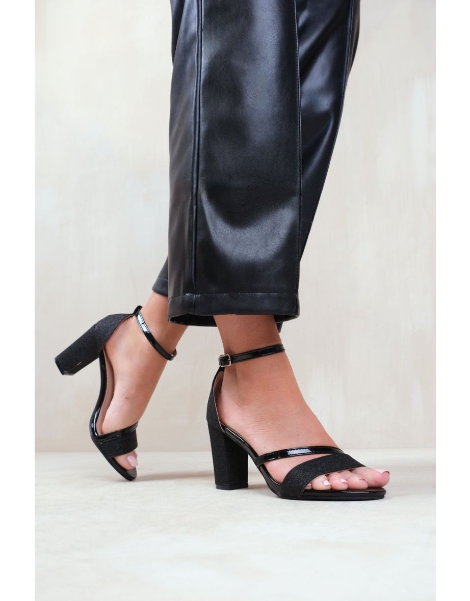 PERLA MID HIGH BLOCK HEEL SANDALS WITH ANKLE STRAP IN BLACK GLITTER