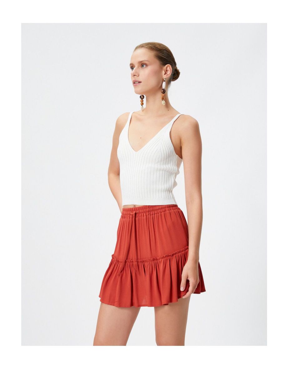 Viscose Mini Skirt with Tie Waist and Ruffles in a Comfortable Cut.
