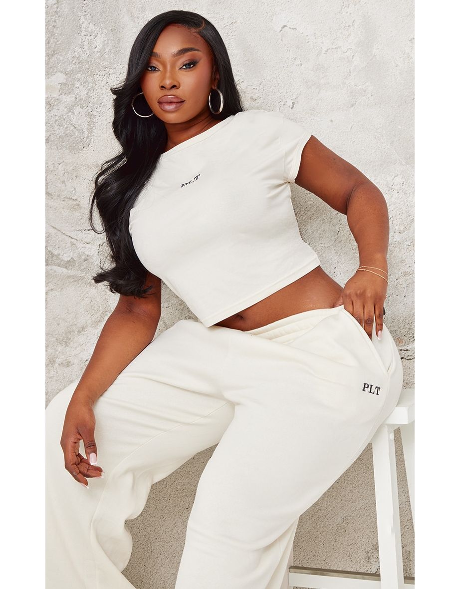 PRETTYLITTLETHING Plus Cream Contrast Embroidery Fitted Cap Sleeve T Shirt