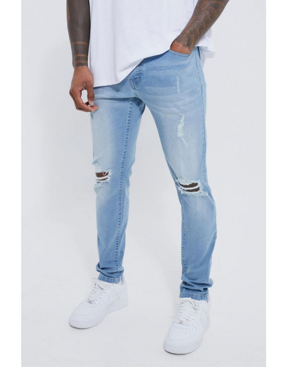 Skinny Stretch Exploded Knee Ripped Jeans - light blue
