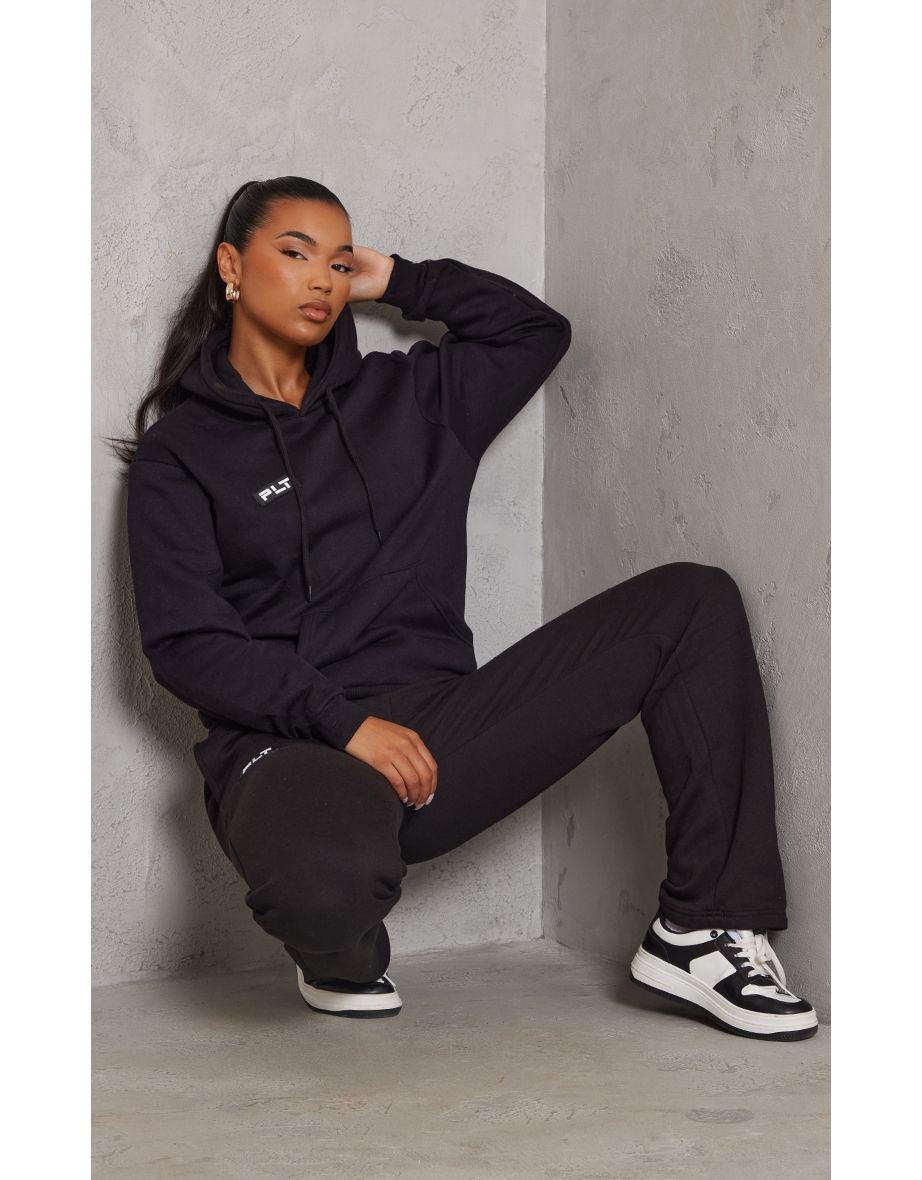 Shop PRETTYLITTLETHING Logo Black Badge Detail Oversized Fit Hoodie Online in Qatar VogaCloset