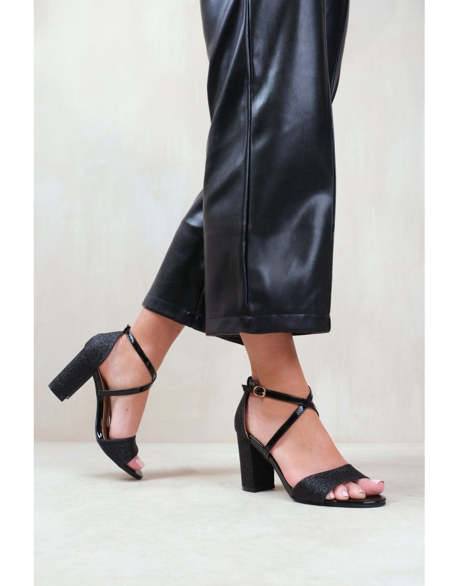 RUTH MID HIGH BLOCK HEEL SANDALS WITH CROSS OVER ANKLE STRAP IN BLACK