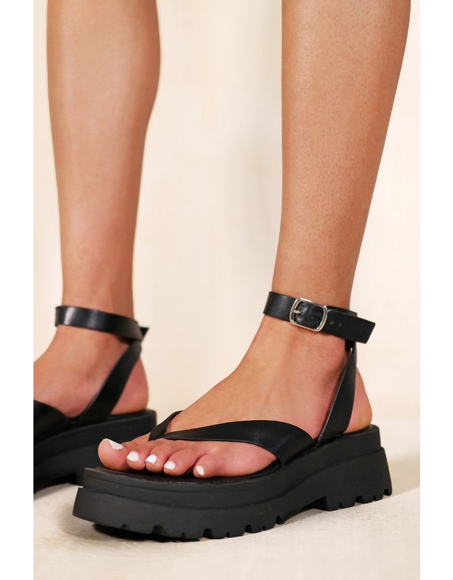 CHUNKY SOLE STRAPPY SANDAL WITH TOE THONG IN BLACK FAUX LEATHER - 1