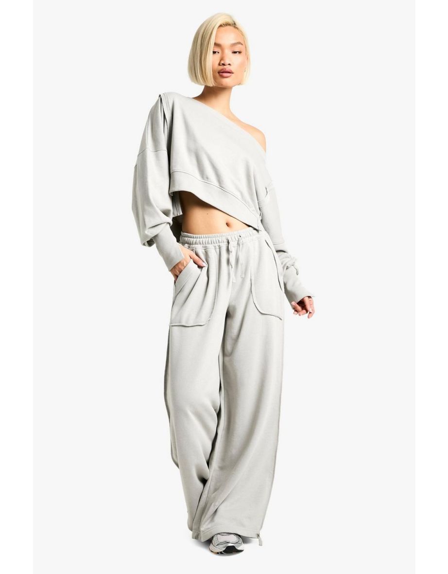 DECONSTRUCTED OFF SHOULDER CROPPED SWEATSHIRT