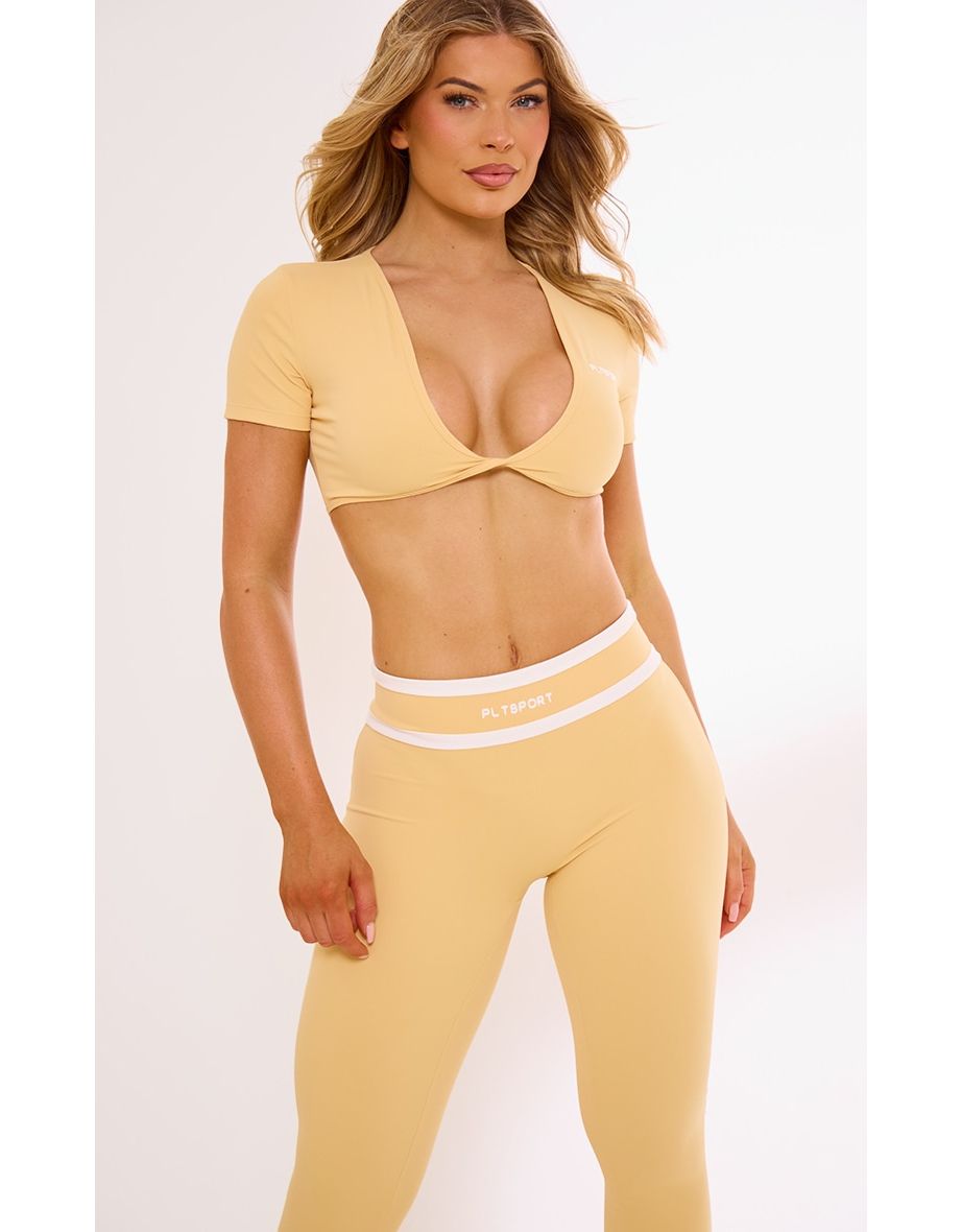PLT SPORT Peach Sculpt Twist Front Contrast Detail Open Back Crop Top
