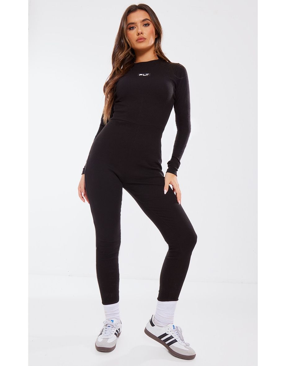 Shop PRETTYLITTLETHING Black Ribbed Long Sleeve Jumpsuit Online in Oman VogaCloset