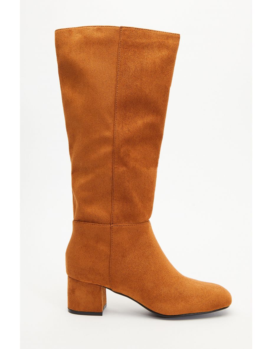 Tan coloured knee high clearance boots