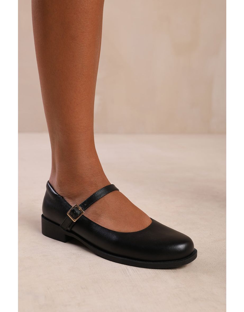 Shop KINGSTON WIDE FIT LOW HEEL LOAFER WITH STRAP AND BUCKLE DETAIL IN BLACK FAUX LEATHER Online in Oman VogaCloset