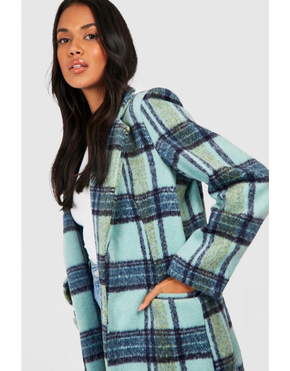 green and blue check coat