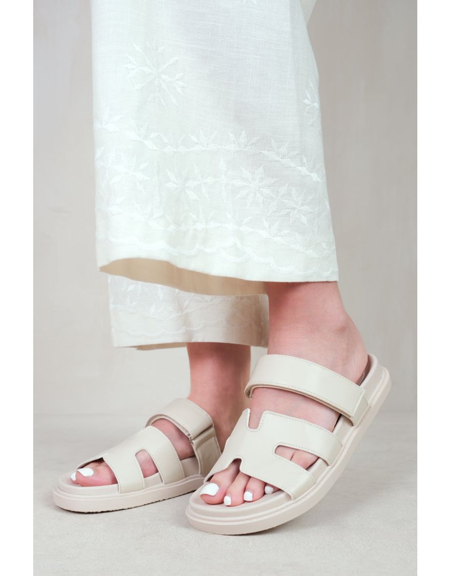 ADAGIO STRAPPY SANDALS IN NUDE FAUX LEATHER