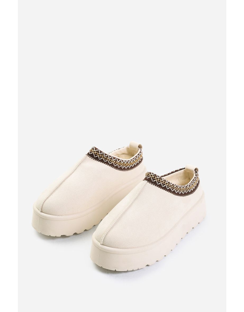 ALLEGRA FLATFORM EMBROIDERED LOW ANKLE SLIPPER BOOTS IN CREAM SUEDE