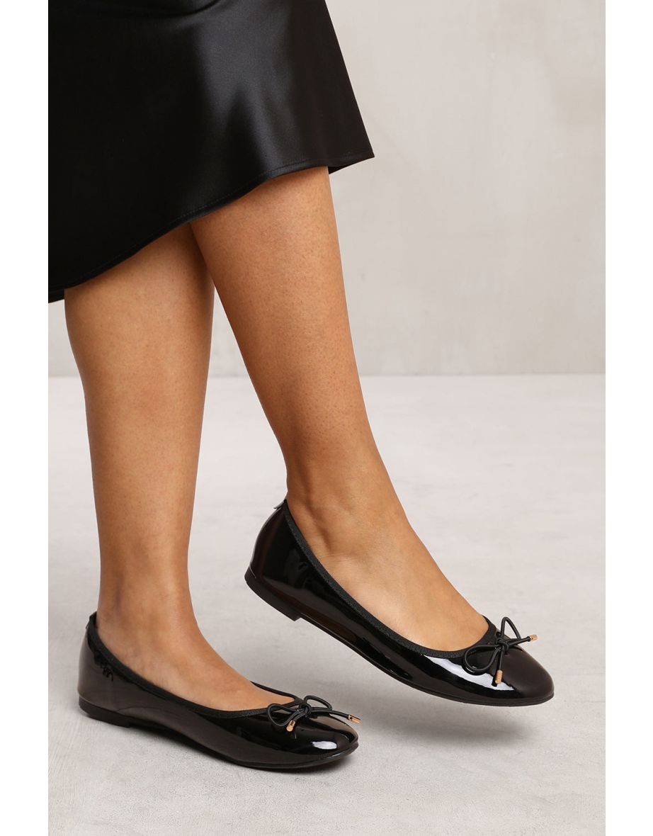 TALLULAH WIDE FIT SLIP ON FLAT PUMPS IN BLACK PATTENT