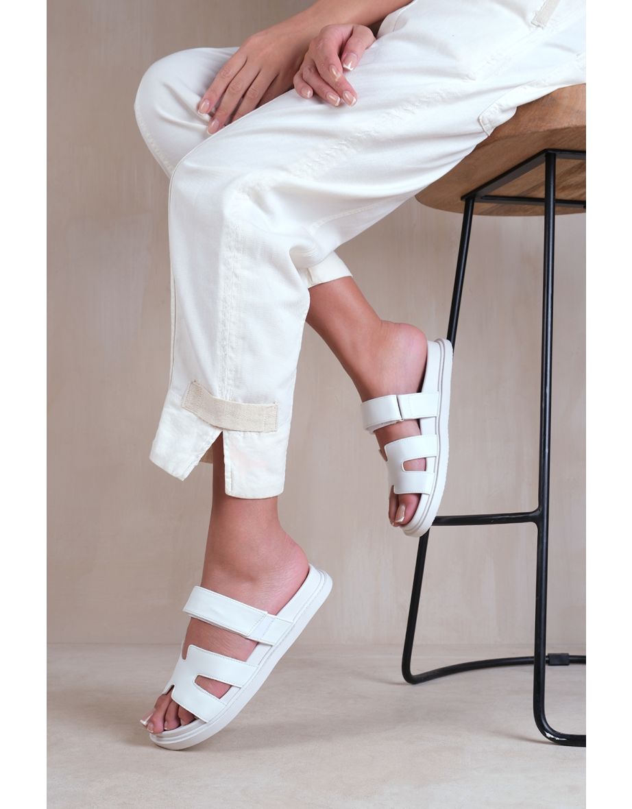 ADAGIO STRAPPY SANDALS IN WHITE FAUX LEATHER