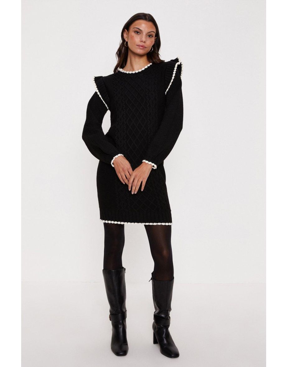 Black jumper dress with white frill hotsell