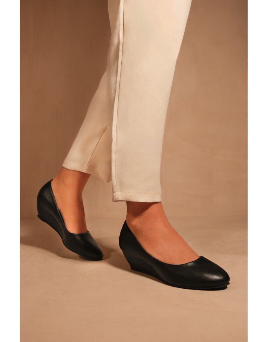 KIERAN PLATFORM LOW WEDGE MID HEEL COURT SHOES IN BLACK