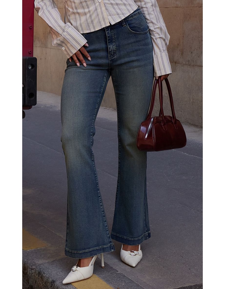 Vintage Wash Dipped Waistband Distressed Flared Jeans