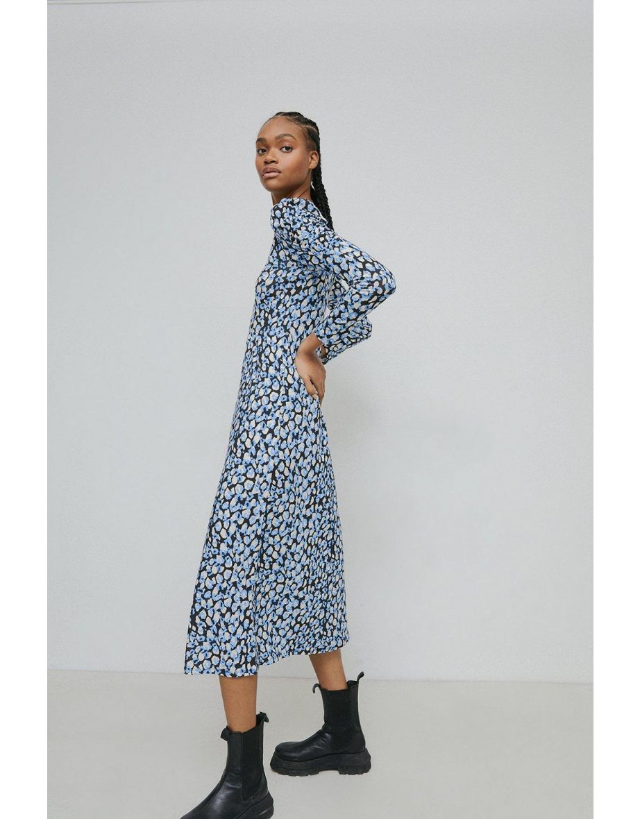 Leopard print midi dress warehouse best sale