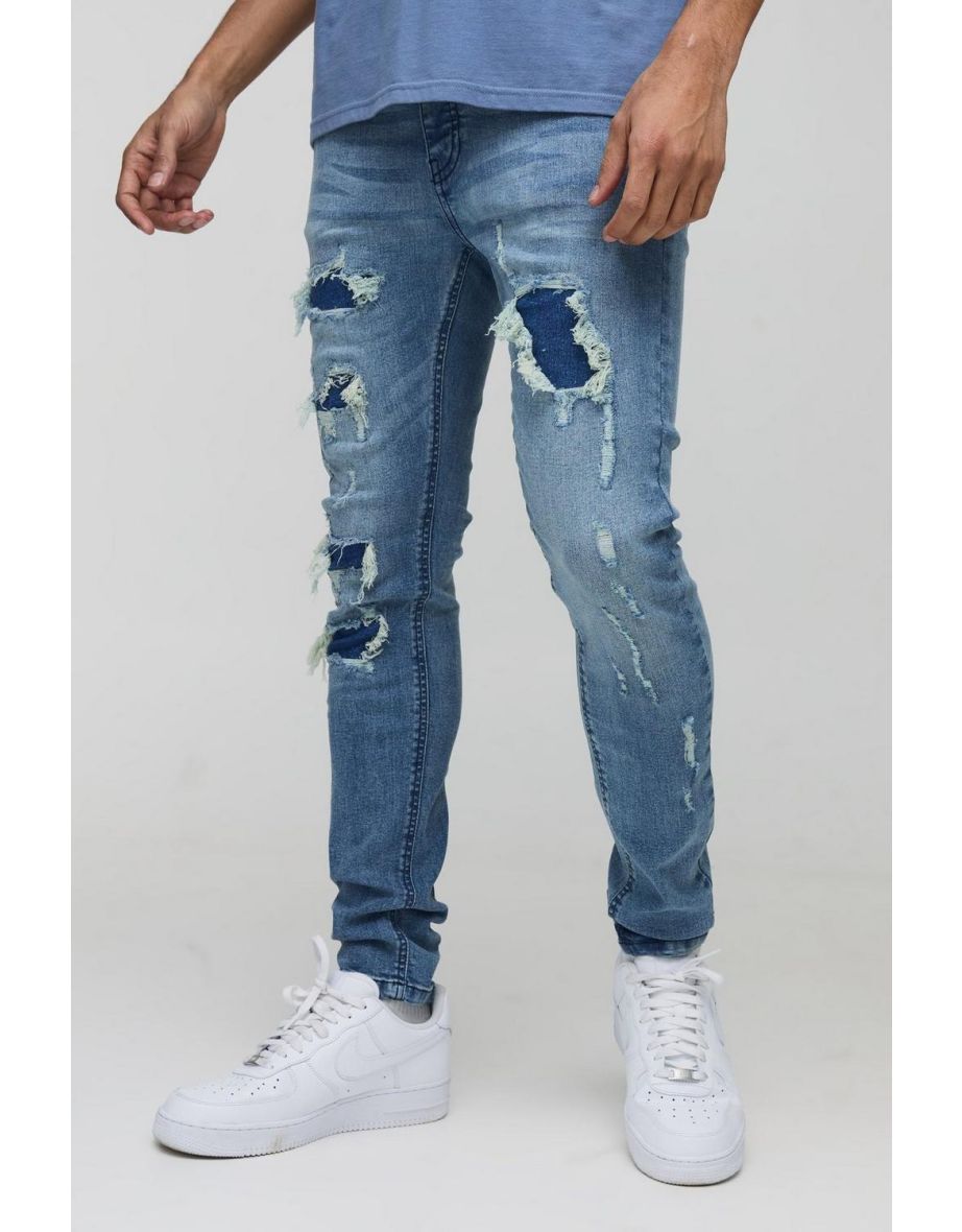 Super Distressed Dirty Wash Skinny Jeans