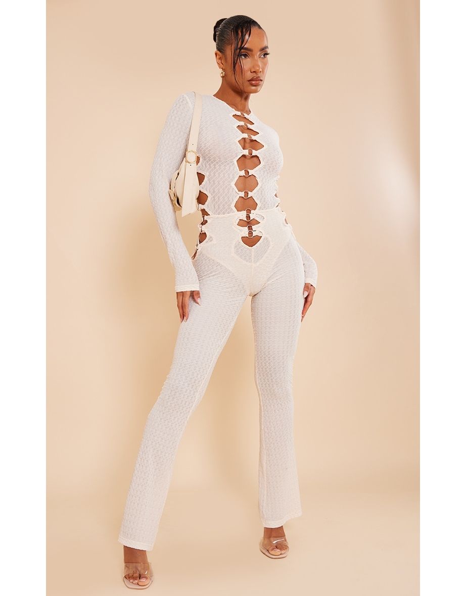 Cream Textured Ring Front Flare Trousers