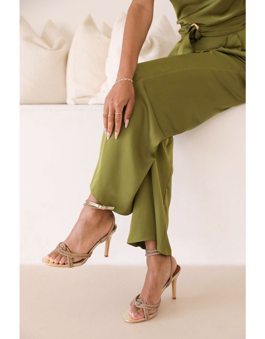 MADON DIAMANTE KNOT DETAIL WITH CROSS OVER ANKLE STRAP HIGH HEELS IN GOLD CHROME