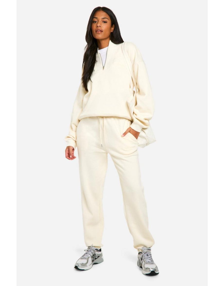 Cream tracksuit on sale