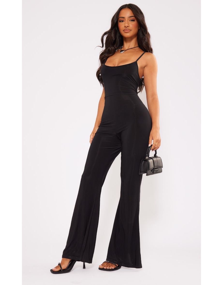 Shop Petite Black Slinky Flared Jumpsuit Online in Iraq VogaCloset