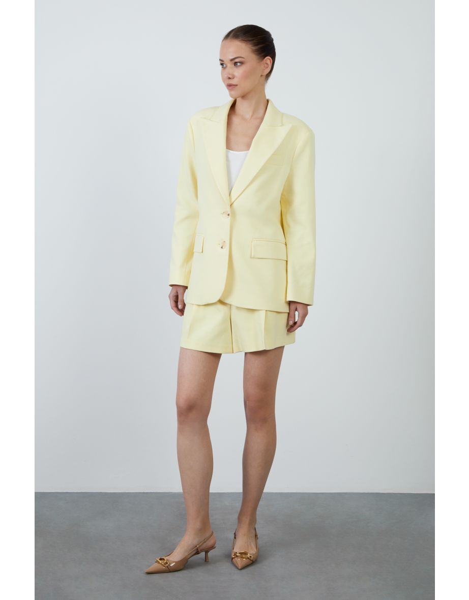 Yellow blazer with Origami Pleat Detail on Sleeves