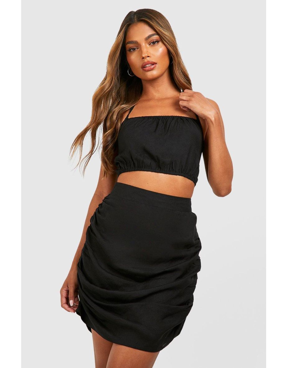 Short skirt and halter-neck crop top with neck co-ord