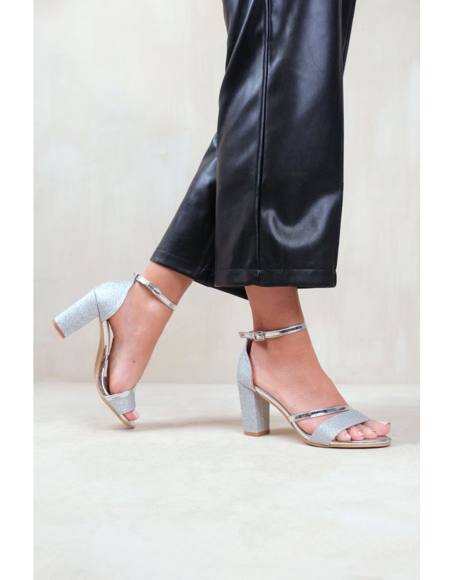PERLA MID HIGH BLOCK HEEL SANDALS WITH ANKLE STRAP IN MOON SILVER GLITTER